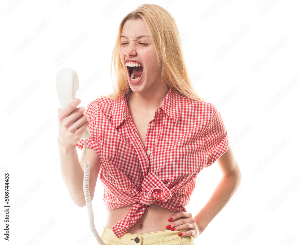 Angry sad blonde woman holding telephone tube. Phone call. Woman shouting a phone, listen bad news. Screaming woman face with telephone tube isolated on white. Angry sad blonde woman holding telephone tube. Phone call. Woman shouting a phone, listen bad news. Screaming woman face with telephone tube isolated on white.