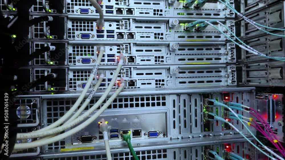Optical fiber. Severs computer in a rack at the large data center. Optical fiber. Severs computer in a rack at the large data center.