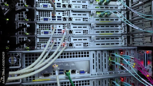 Optical fiber. Severs computer in a rack at the large data center.