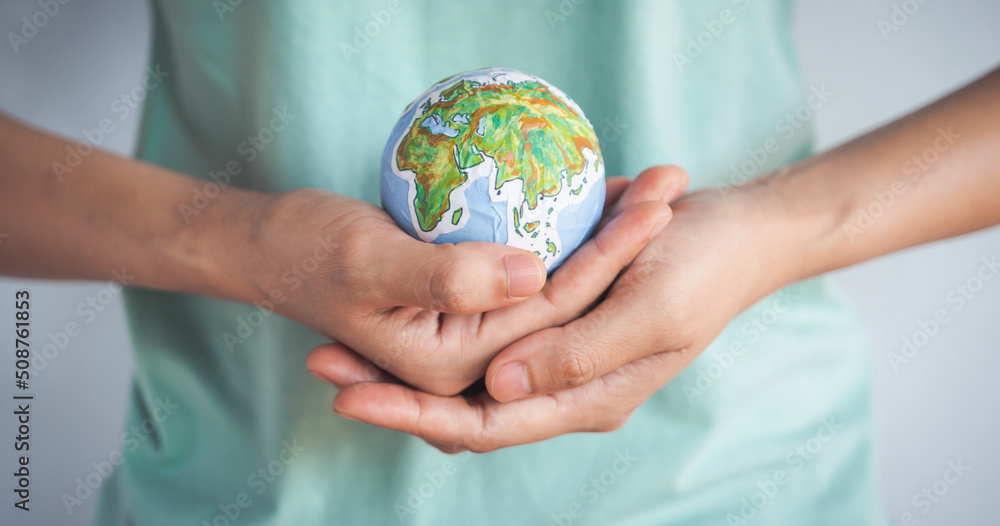 Woman holding earth in hands, Energy saving concept. Woman holding earth in hands, Energy saving concept.