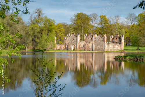 Preili Manor Complex with one of the most fabulous city parks in Preili, Latgale, Latvia surrounded by lake or ponds and green landscape