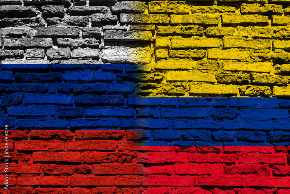 Background with the flag of Russia and Colombia on a brick wall Background with the flag of Russia and Colombia on a brick wall