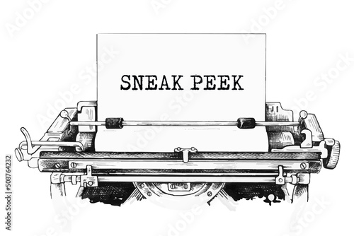SNEAK PEEK typed words on a old Vintage Typewriter.