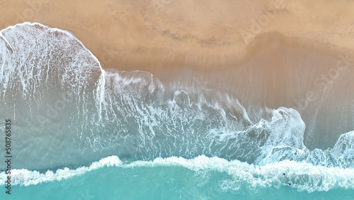 Summer tropical ocean turquoise background with seascape with beach waves from aerial Top view from drone. Travel concept