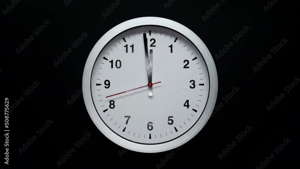 Grey Wall Clock With A Black Arrows And Red Second Hand On Black Background. Wall Clock Face Of Time Of 12.00 Am Or Pm. 4k. ProRes. Timelapse. Grey Wall Clock With A Black Arrows And Red Second Hand On Black Background. Wall Clock Face Of Time Of 12.00 Am Or Pm. 4k. ProRes. Timelapse.