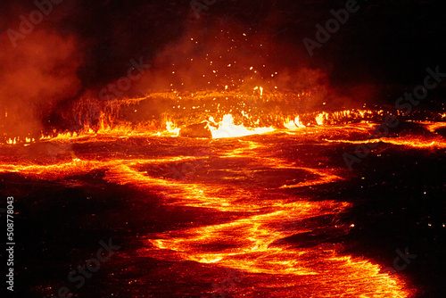 Erta Ale lava lake after sunset with black undulating lava, Danakil, Afar Region, Ethiopia