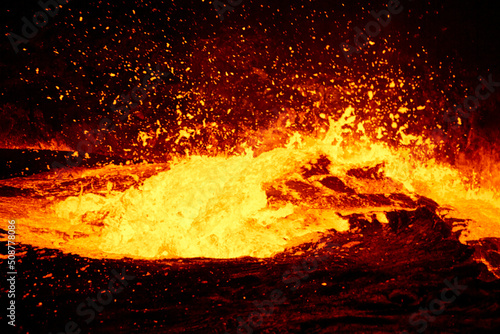 Erta Ale lava lake after sunset with black undulating and exploding lava, Danakil, Afar Region, Ethiopia