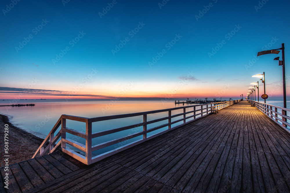 Sunrise over the pier in Mecheliki Sunrise over the pier in Mecheliki