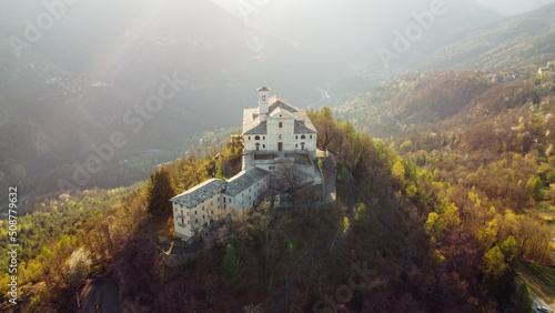 Aerial view of Sanctuary of Saint Ignatius of Loyola situated in the Lanzo Valleys in Italy. Tourist attraction and famous place of pilgrimage in Province of Turin, Piedmont region. Drone photography. photo