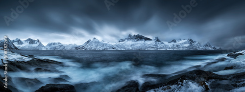 Print op canvas Fjord in Senja near Lofoten in norway in bad weather with stormy sea and fast mo