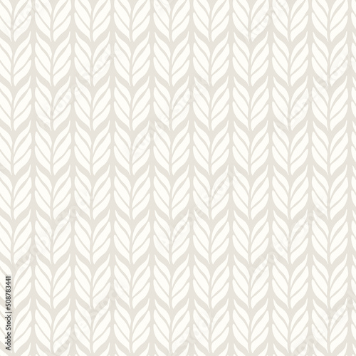 Knitting seamless pattern. Vector background with knitted woolen fabric in light color.