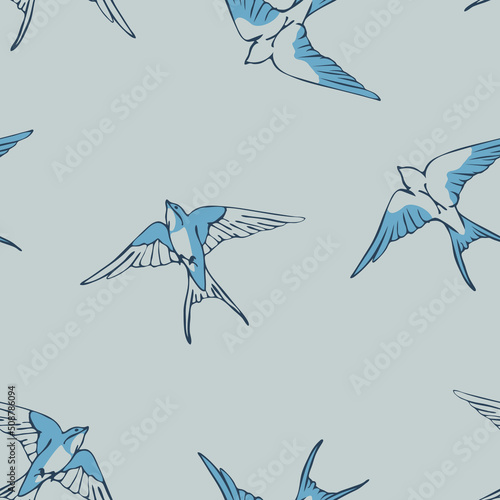 Seamless vector pattern with swallow bird doodle on grey background. Simple flock of bird wallpaper design. Decorative blue bird fashion textile.