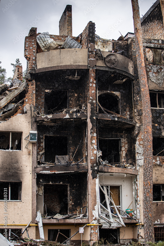 Cities of Ukraine after the Russian occupation. Destroyed buildings on the streets of Irpen. Broken, shelled windows. Buildings after being hit by missiles.