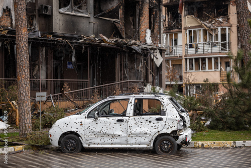 Shot cars. On the streets of Irpin. Cities of Ukraine after the Russian occupation. Irpin, Bucha, Hostomel. photo