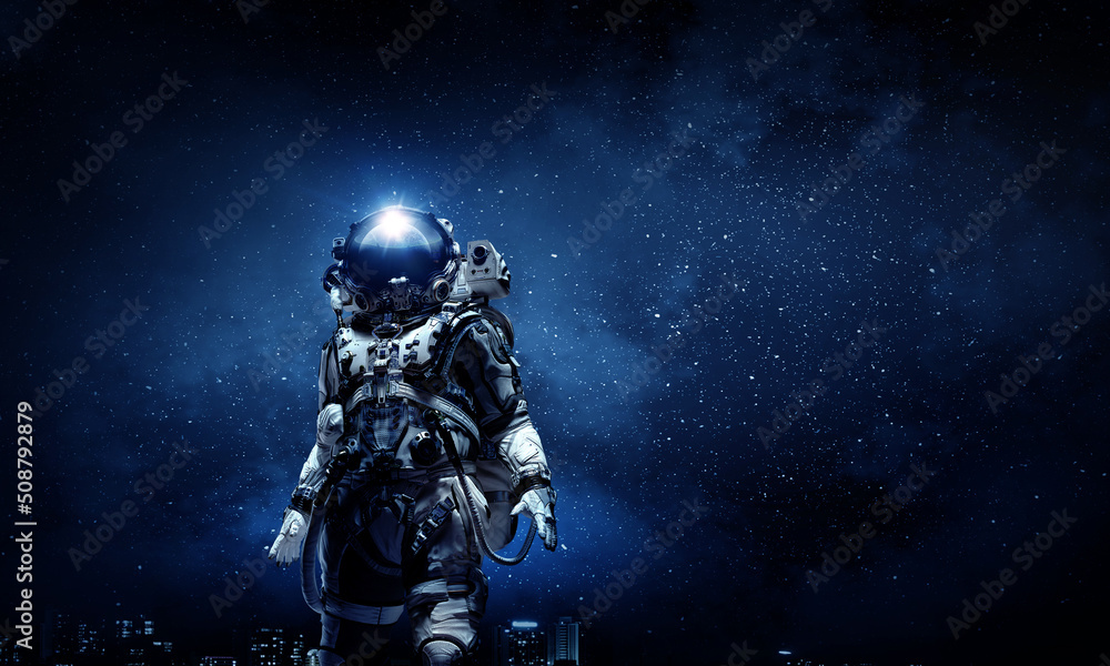 Astronaut walking on an unexplored planet Astronaut walking on an unexplored planet