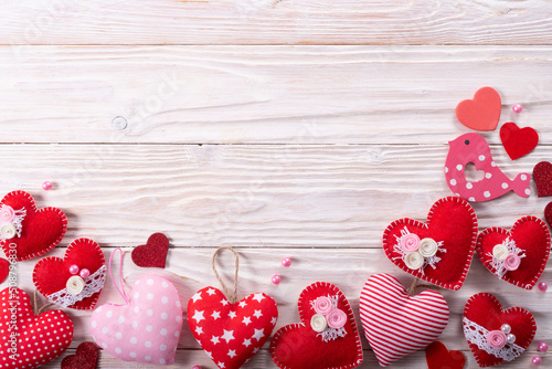 Valentine handmade heart flat lay background on white wooden table
