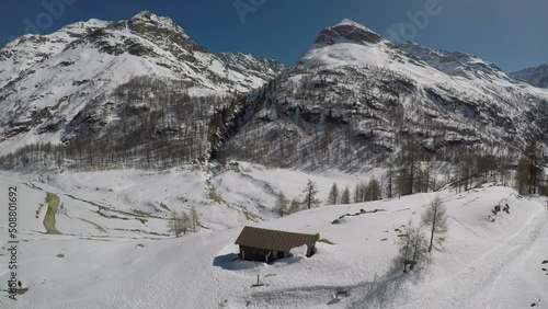 Snow-covered mountain hut