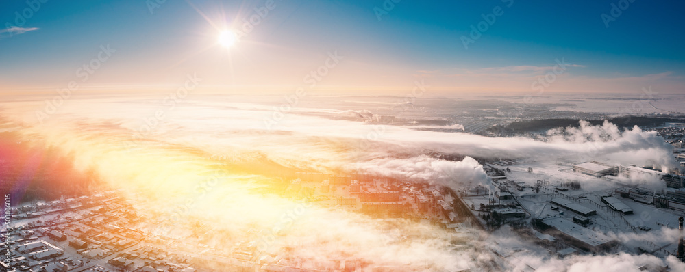 panorama Aerial View Top Elevated View Winter Snowy Forest Landscape. Steam Light Clouds Flowing On Air. Sunny Winter Frozen Day. Misty Morning Sunrise. panorama Factory Bird's-eye View At Sunny Snowy panorama Aerial View Top Elevated View Winter Snowy Forest Landscape. Steam Light Clouds Flowing On Air. Sunny Winter Frozen Day. Misty Morning Sunrise. panorama Factory Bird's-eye View At Sunny Snowy