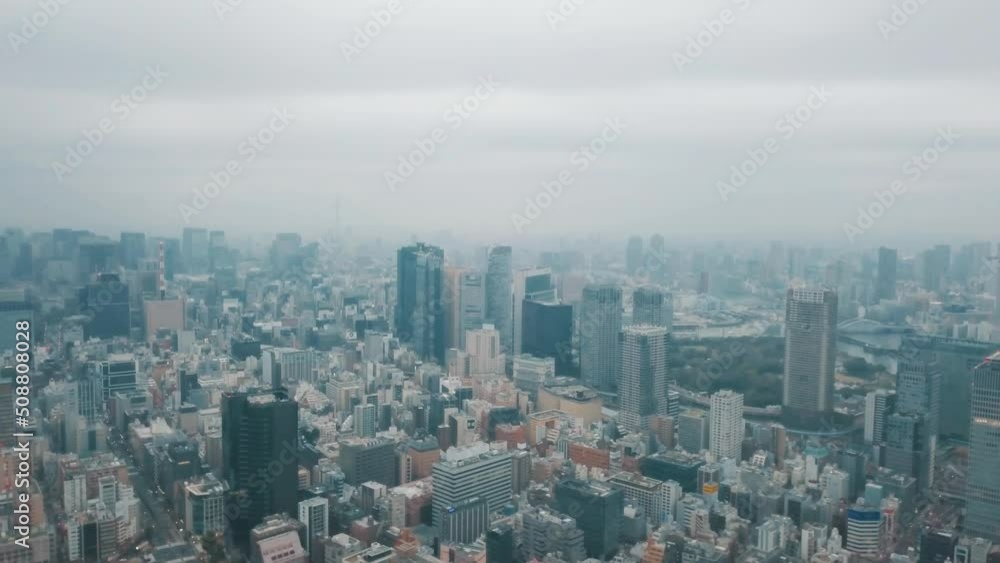 Aerial drone shot of the cityscape of Tokyo, Japan on a cloudy day Aerial drone shot of the cityscape of Tokyo, Japan on a cloudy day