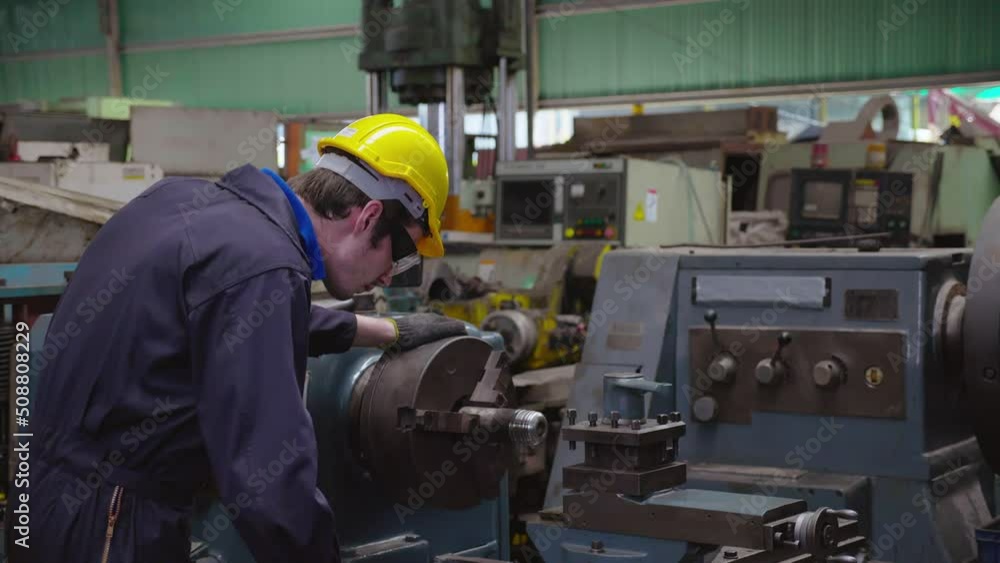 Caucasian man machine technician perform mechanical check to perfection of working in industrial plant with expertise. Worker male work with professional confident. Concept Blue collar Caucasian man machine technician perform mechanical check to perfection of working in industrial plant with expertise. Worker male work with professional confident. Concept Blue collar