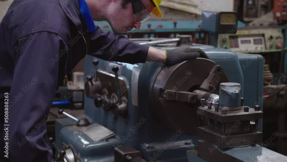 Caucasian man machine technician perform mechanical check to perfection of working in industrial plant with expertise. Worker male work with professional confident. Concept Blue collar Caucasian man machine technician perform mechanical check to perfection of working in industrial plant with expertise. Worker male work with professional confident. Concept Blue collar