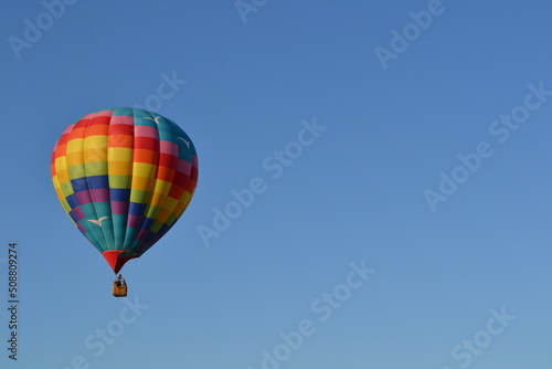 Colorful hot air balloon launching into the sky