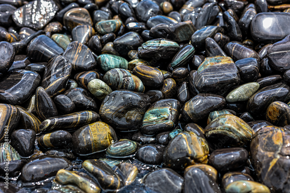 Absract black pebble on the beach for nature background. Absract black pebble on the beach for nature background.