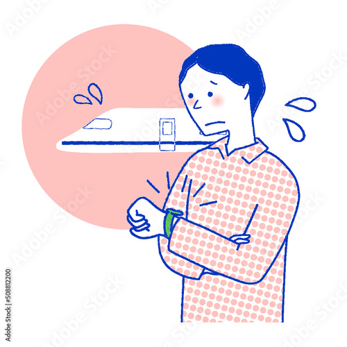 新幹線の遅延に困る男性
