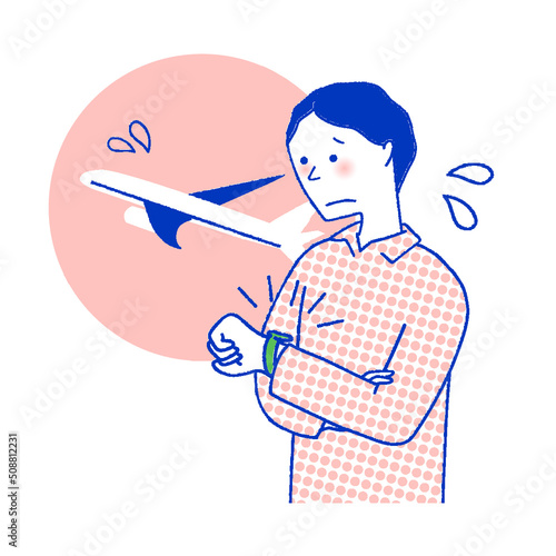 飛行機の遅延に困る男性
