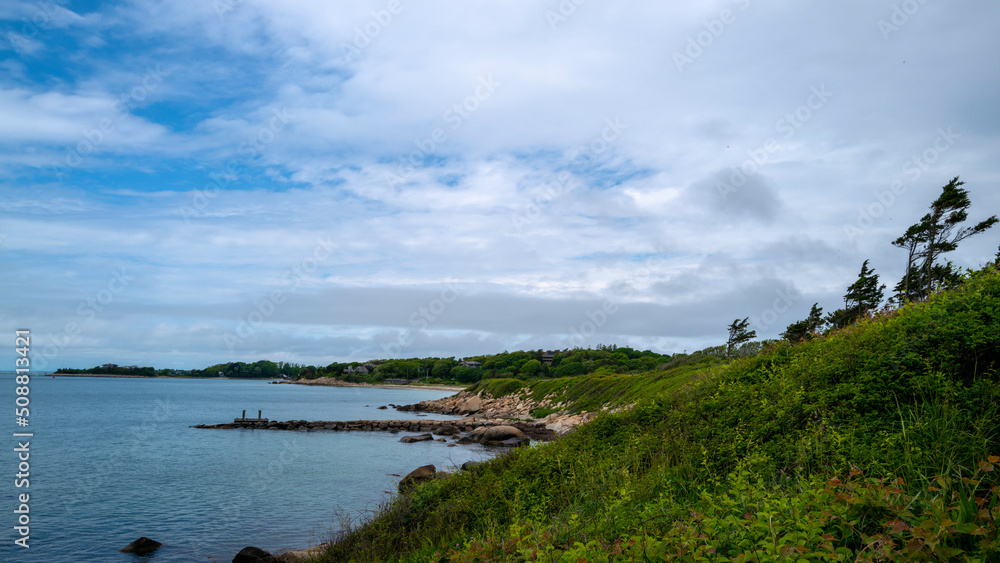 Tranquil moody harbor with jetties in the Vineyard Sound of the Atlantic Ocean.