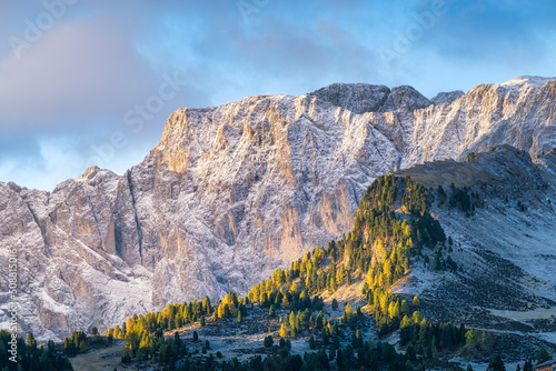 High rocks during sunset. Dolomite Alps, Italy. Mountains and cloudy skies. V...