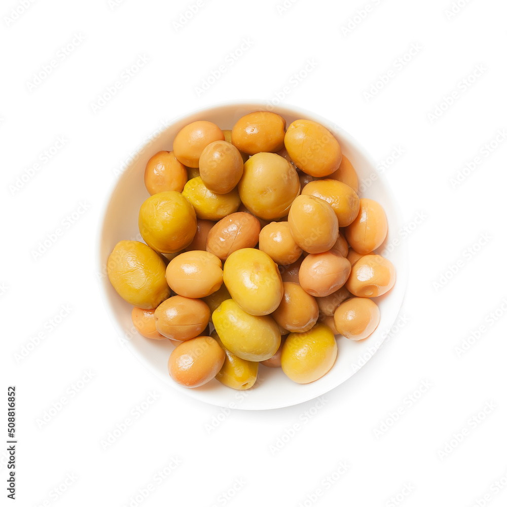 large green olives in a white bowl, isolated, view from above large green olives in a white bowl, isolated, view from above