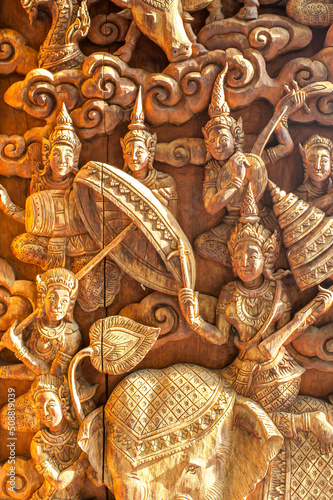 Buddism style 3D Angels textured Brick wall at Wat Sisrathong temple, Nakhon Pathom City, Thailand