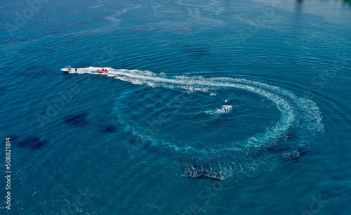 Aerial drone shot of a post boat loop in the Mediterranean Sea. © Daniel