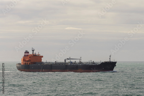 Tanker. Cargo vessel at sea. Beautifil light.