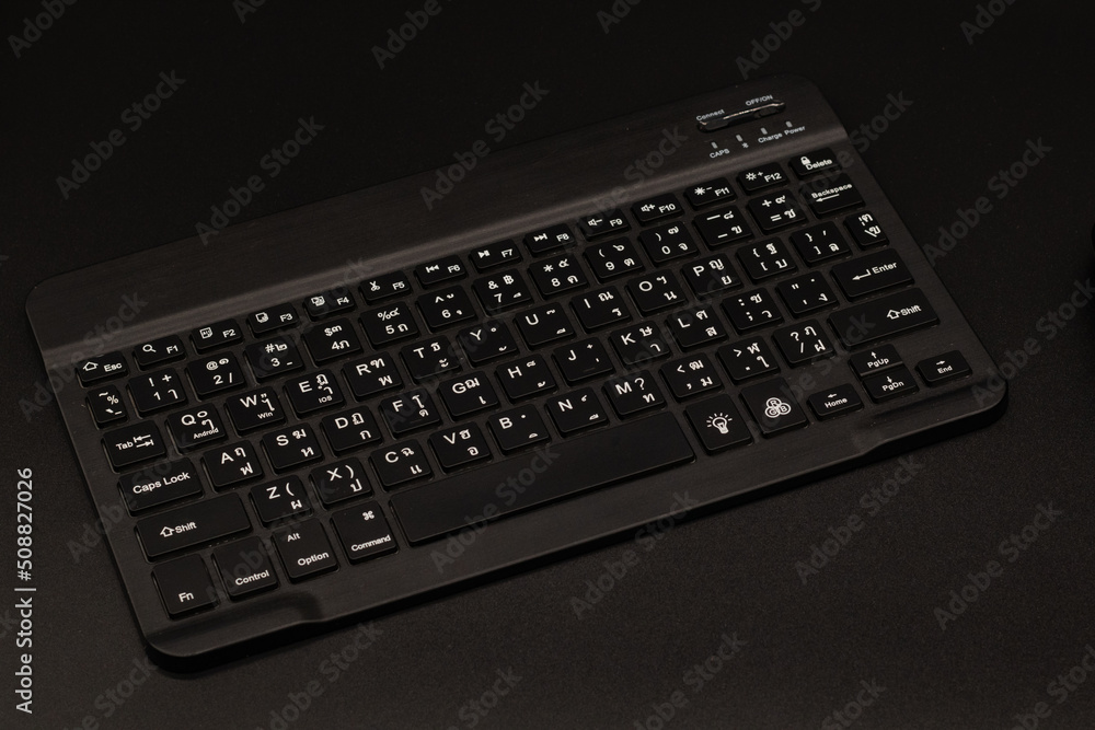 Thai typing keyboard, black on the table