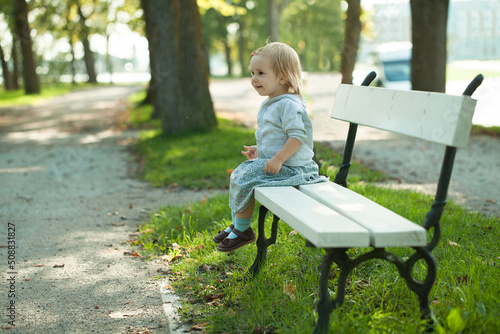 Smiling little girl in the park.