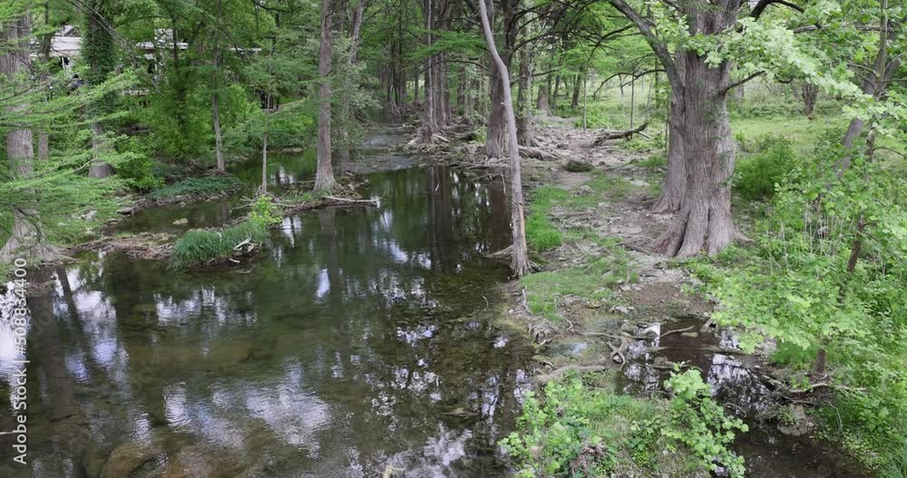 Wimberley Texas Blanco River trees. Wimberley Texas on the Blanco River in the Hill Country of central Texas. A tourist and recreation destination for nature and landscape beauty. Wimberley Texas Blanco River trees. Wimberley Texas on the Blanco River in the Hill Country of central Texas. A tourist and recreation destination for nature and landscape beauty.