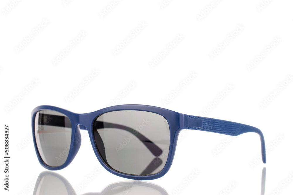 One sunglasses, close-up, isolated on a white background. One sunglasses, close-up, isolated on a white background.