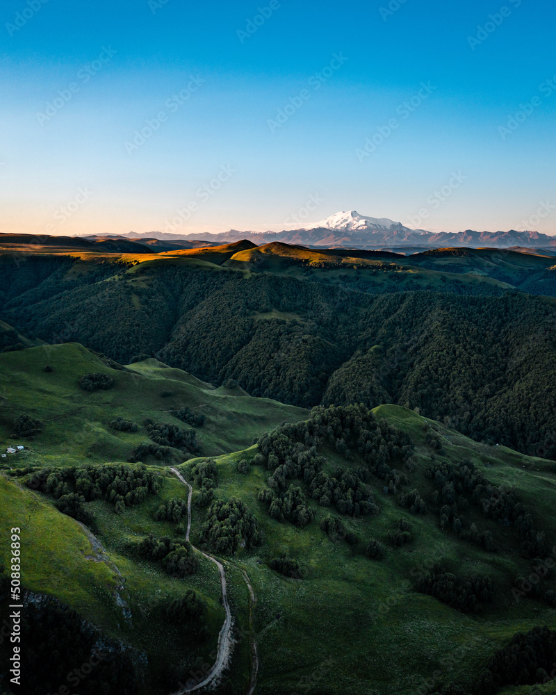 Green valley in the foothills with fantastic perspective view