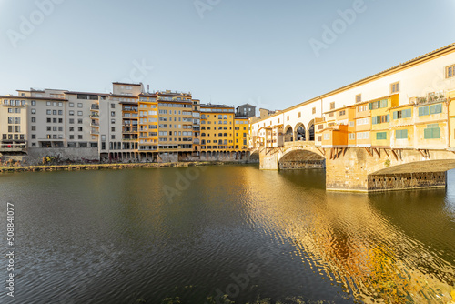Morning view on famous Old bridge called Ponte Vecchio on Arno river in Florence  Italy. Concept of traveling Italy and visiting italian landmarks