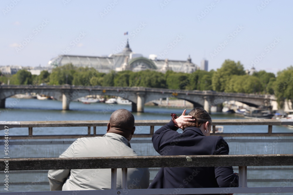 Couple on a bridge in Paris