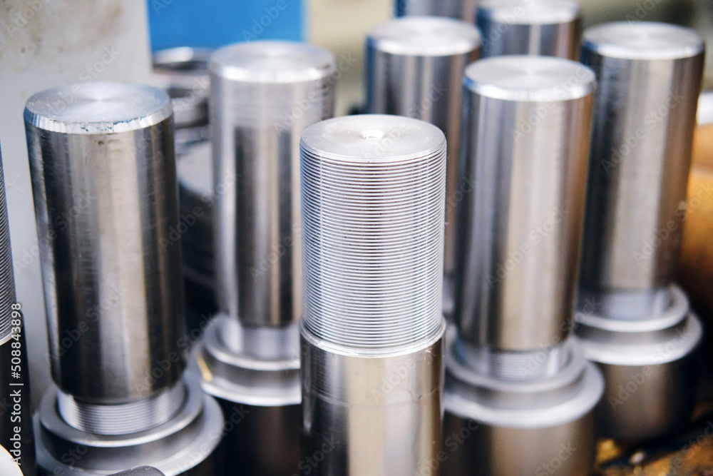 metal chrome parts in the form of threaded cylinders metal chrome parts in the form of threaded cylinders