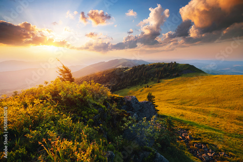 Fantastic view of the sunset over the mountain ranges. Carpathian mountains, Ukraine, Europe.