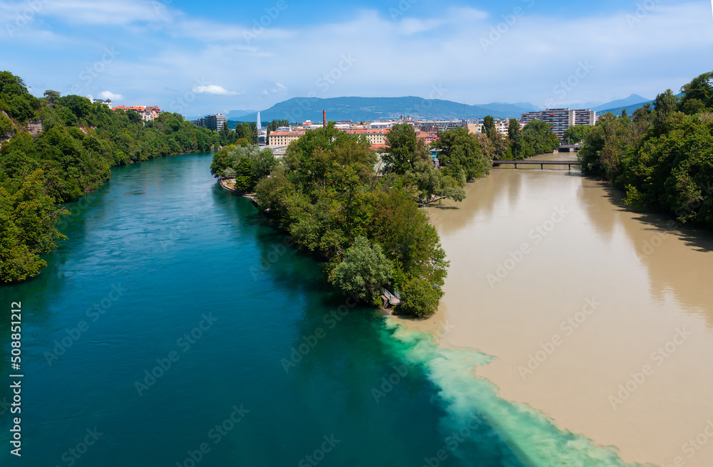 Famous La Jonction, the joint and confluence of  rivers Rhone on the left and Arve on the right in Geneva, Switzerland.
