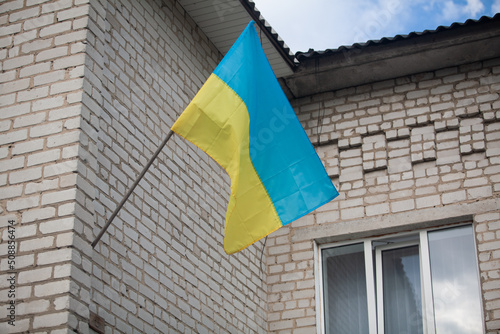 Ukrainian flag on the building wall