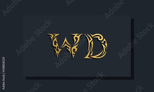 Luxury initial letters WD logo design. It will be use for Restaurant, Royalty, Boutique, Hotel, Heraldic, Jewelry, Fashion and other vector illustration