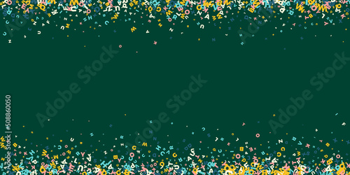 Falling letters of English language. Light flying words of Latin alphabet. Foreign languages study concept. Positive back to school banner on blackboard background.