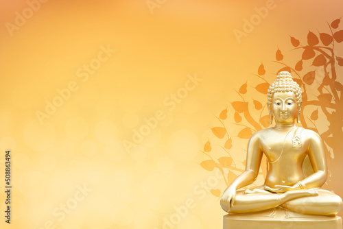 Buddha statue and bodhi tree on gold background.