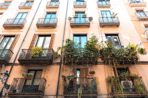 Classic apartment building with balconies and shutters in Barcelona Fototapet